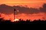 Zachód słońca widziany zza biurka stojącego w OW AUGUSTYNA w Jastarni na Półwyspie Helskim